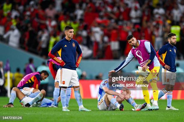 Team of Spain looks dejected after the Round of 16 - FIFA World Cup Qatar 2022 match between Morocco and Spain at the Education City Stadium on...