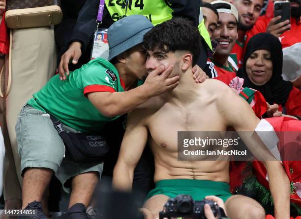 Abde Ezzalzouli of Morocco celebrates with fans at full time during the FIFA World Cup Qatar 2022 Round of 16 match between Morocco and Spain at...