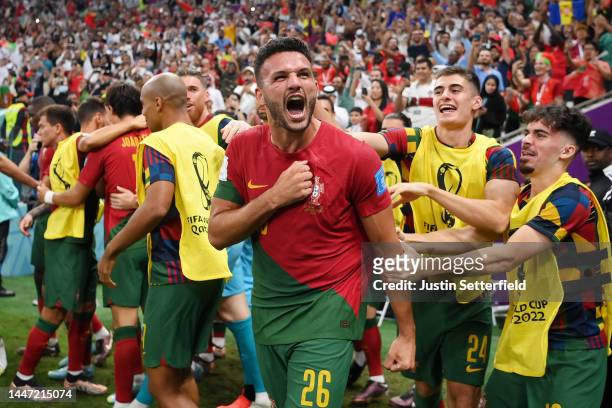 Goncalo Ramos of Portugal celebrates with teammates after scoring the team's first goal during the FIFA World Cup Qatar 2022 Round of 16 match...