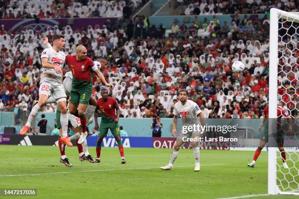 Pepe of Portugal scores the team's second goal during the FIFA World Cup Qatar 2022 Round of 16 match between Portugal and Switzerland at Lusail...