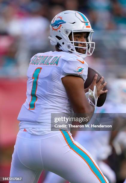 Tua Tagovailoa of the Miami Dolphins throws a pass against the San Francisco 49ers during the first quarter of an NFL football game at Levi's Stadium...