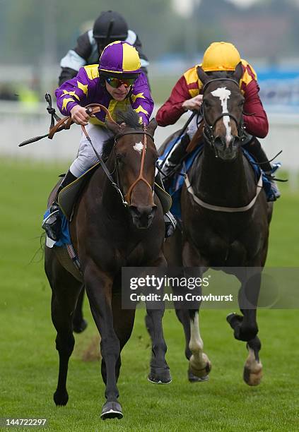 Richard Kingscote riding Ceiling Kitty win The Langleys Solicitors LLP EBF Marygate Fillies' Stakes at York racecourse on May 18, 2012 in York,...