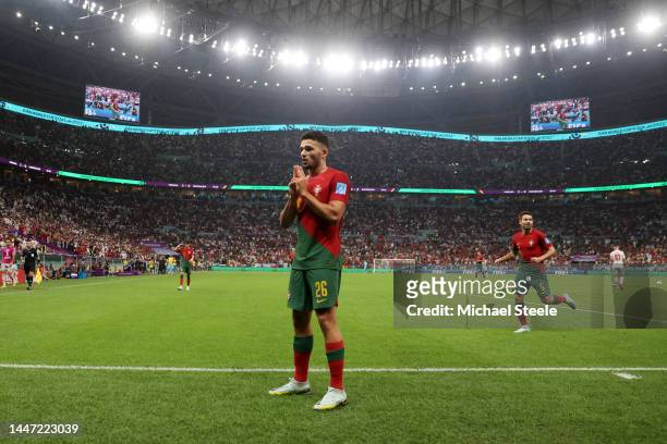 Goncalo Ramos of Portugal celebrates after scoring the team's third goal during the FIFA World Cup Qatar 2022 Round of 16 match between Portugal and...