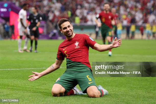 Raphael Guerreiro of Portugal celebrates after scoring the team's fourth goal during the FIFA World Cup Qatar 2022 Round of 16 match between Portugal...