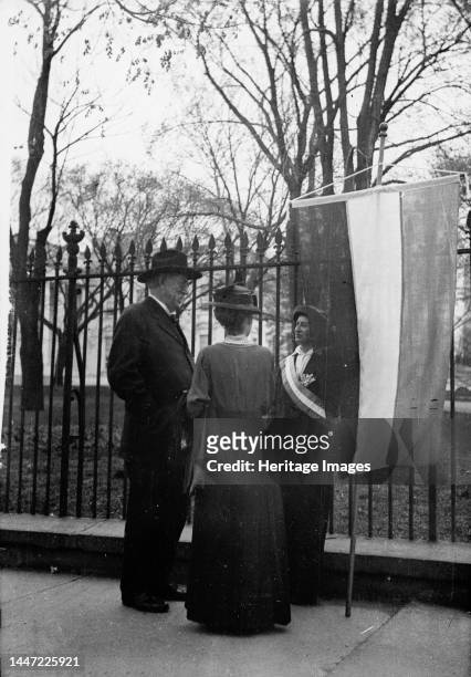 Woman Suffrage - David Starr Jordan And Wife Talking with White House Picket, 1917. Creator: Harris & Ewing.