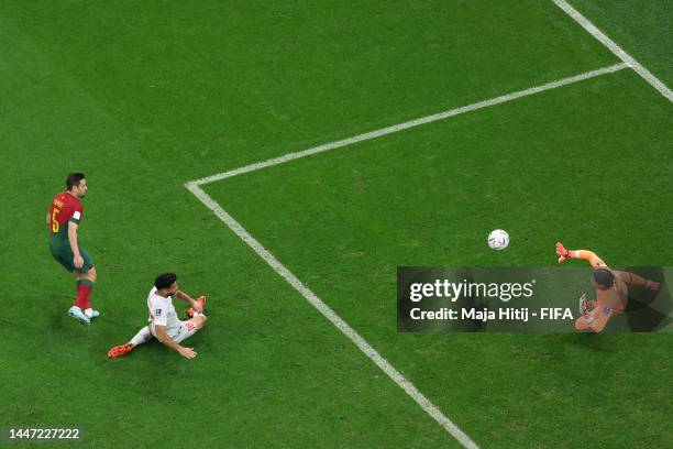 Raphael Guerreiro of Portugal scores the team's fourth goal past Yann Sommer of Switzerland during the FIFA World Cup Qatar 2022 Round of 16 match...