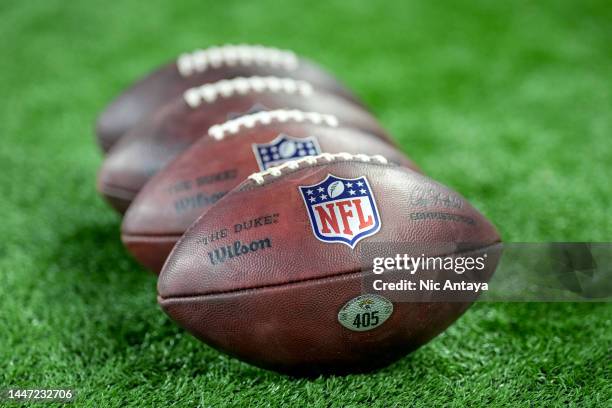Wilson brand footballs are pictured with the NFL logo before the game between the Detroit Lions and Jacksonville Jaguars at Ford Field on December...