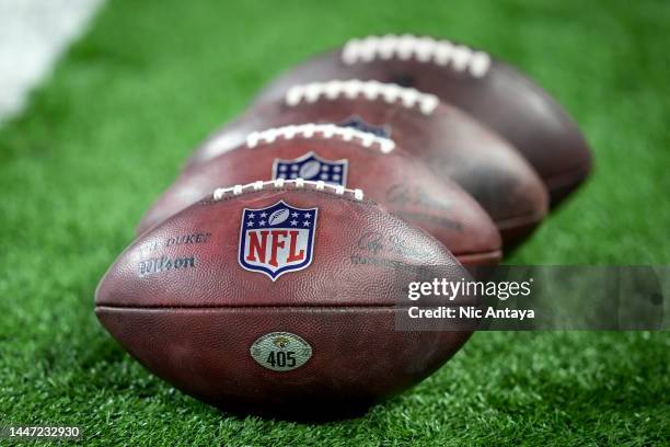 Wilson brand footballs are pictured with the NFL logo before the game between the Detroit Lions and Jacksonville Jaguars at Ford Field on December...