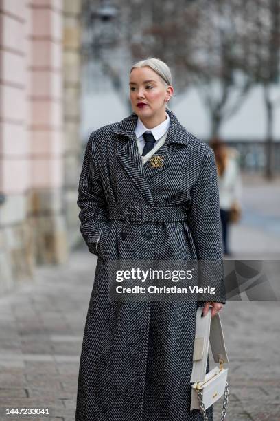 Tina Haase wears Nakdfashion tweed coat & tweed pants, Sourceunknown cropped white shirt & knit sweater, black men's tie, Billi Bi Cph platform...