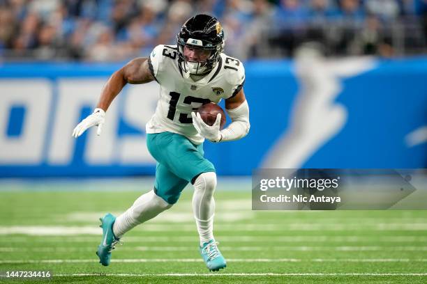 Christian Kirk of the Jacksonville Jaguars runs in action against the Detroit Lions at Ford Field on December 04, 2022 in Detroit, Michigan.