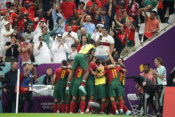 Goncalo Ramos of Portugal celebrates with team mates after scoring is opening goal during the FIFA World Cup Qatar 2022 Round of 16 match between...