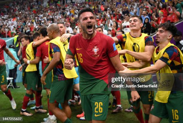 Goncalo Ramos of Portugal celebrates after scoring the team's first goal during the FIFA World Cup Qatar 2022 Round of 16 match between Portugal and...