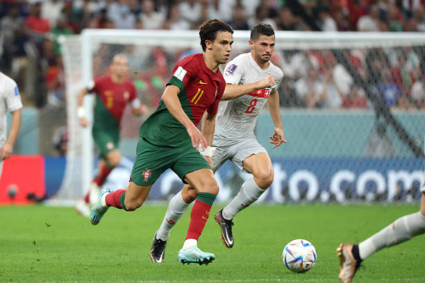 Joao Felix of Portugal, Remo Freuler of Switzerland during the FIFA World Cup Qatar 2022 Round of 16 match between Portugal and Switzerland at Lusail...