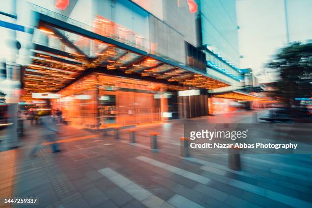 blurred modern shared zone in city. - timelapse new zealand stock pictures, royalty-free photos & images