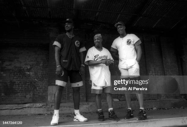 Rapper Chuck D of Public Enemy, Charles Oakley of the New York Knicks and Rick Mahorn of the New Jersey Nets visit a park in Jersey City to meet with...