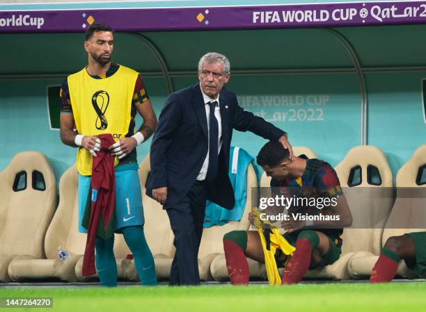 Portugal head coach Fernando Santos prepares substitute Cristiano Ronaldo to come on during the FIFA World Cup Qatar 2022 Round of 16 match between...