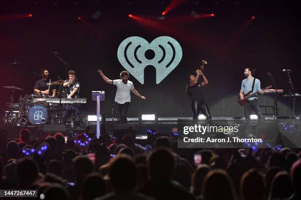 Adam Met, Jack Met and Ryan Met of AJR perform onstage during iHeartRadio Channel 95.5's Jingle Ball 2022 Presented by Capital One at Little Caesars...