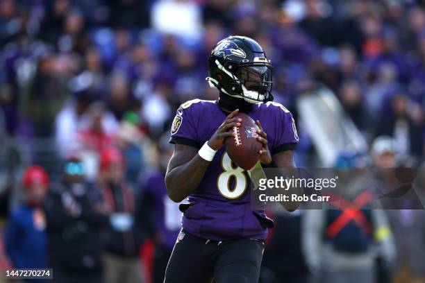Quarterback Lamar Jackson of the Baltimore Ravens drops back to pass against the Denver Broncos at M&T Bank Stadium on December 04, 2022 in...