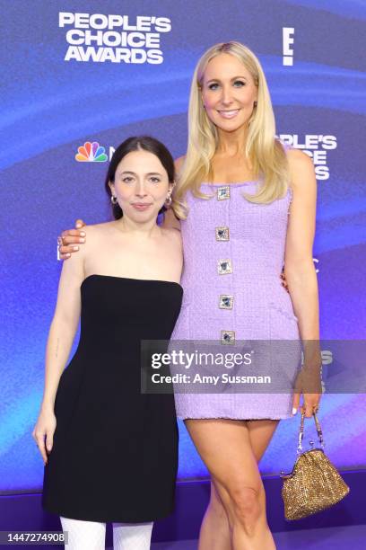 Esther Povitsky and Nikki Glaser attend the 2022 People's Choice Awards at Barker Hangar on December 06, 2022 in Santa Monica, California.