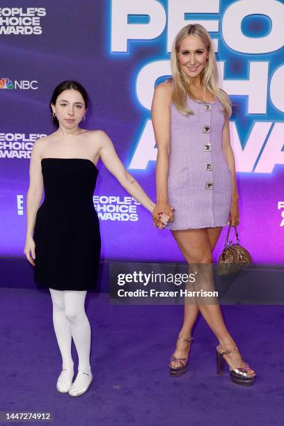 Esther Povitsky and Nikki Glaser attend the 2022 People's Choice Awards at Barker Hangar on December 06, 2022 in Santa Monica, California.