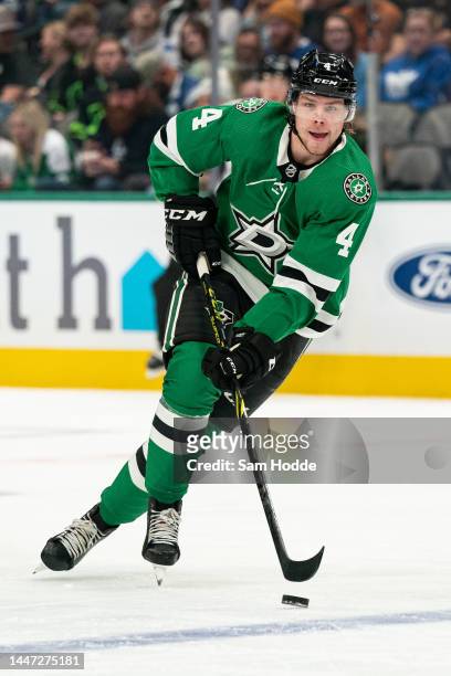 Miro Heiskanen of the Dallas Stars skates with the puck during the first period against the Toronto Maple Leafs at American Airlines Center on...