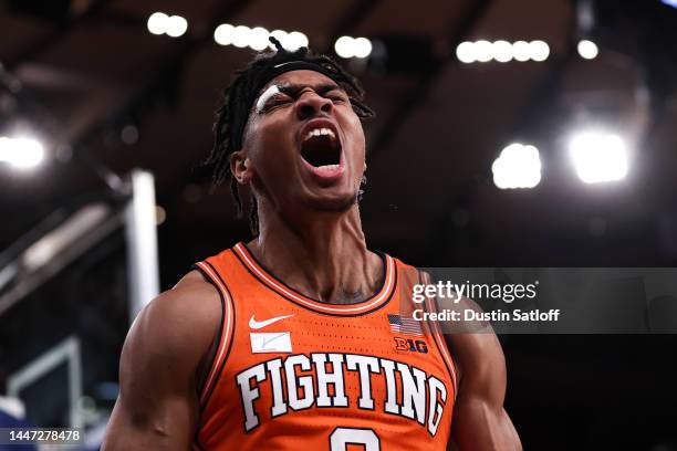 Terrence Shannon Jr. #0 of the Illinois Fighting Illini reacts after scoring a basket during overtime against the Texas Longhorns at Madison Square...