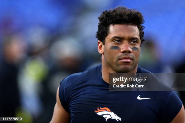 Quarterback Russell Wilson of the Denver Broncos runs off the field following the Broncos 10-9 loss to the Baltimore Ravens at M&T Bank Stadium on...