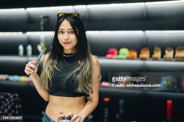portrait of owner woman is recreational cannabis sales begin. - cannabis store stock pictures, royalty-free photos & images