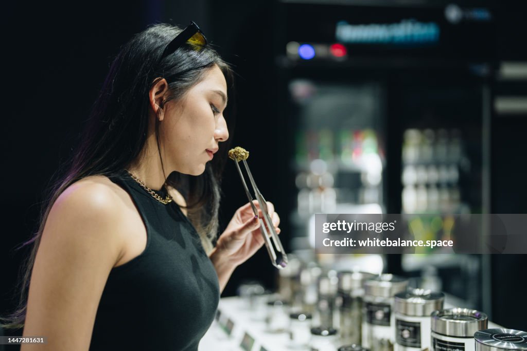 The process of choosing and buying cannabis.