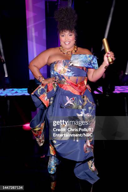 Pictured: Honoree Lizzo, recipient of The Song of 2022 award for ‘About Damn Time’, poses on stage during the 2022 People's Choice Awards held at the...