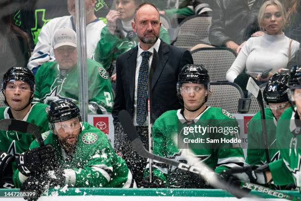 Head coach Peter DeBoer of the Dallas Stars watches play from the bench area during the third period of the game against the Toronto Maple Leafs at...