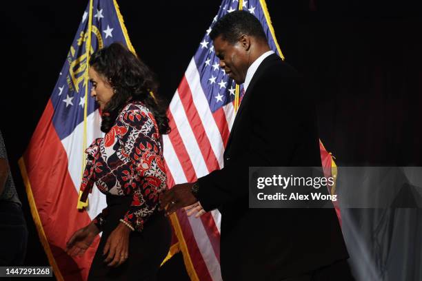 Georgia Republican Senate candidate Herschel Walker and his wife Julie Blanchard leave after he delivered his concession speech during an election...