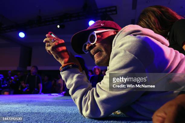 Director Spike Lee watches as Georgia Democratic Senate candidate U.S. Sen. Raphael Warnock spekas during an election night watch party at the...