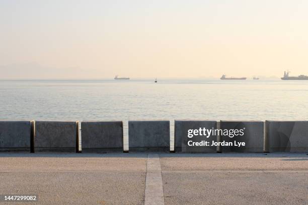 harbour wall - grey pier stock pictures, royalty-free photos & images