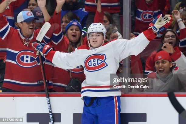 Cole Caufield of the Montréal Canadiens celebrates after scoring a goal against the Vancouver Canucks during the first period of their NHL game at...