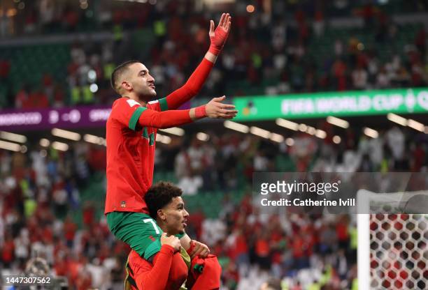 Hakim Ziyech of Morocco celebrates victory following the FIFA World Cup Qatar 2022 Round of 16 match between Morocco and Spain at Education City...