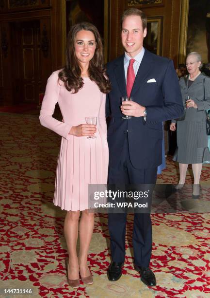 Catherine, Duchess of Cambridge and Prince William, Duke of Cambridge during a reception in the Waterloo Chamber, before the Lunch For Sovereign...