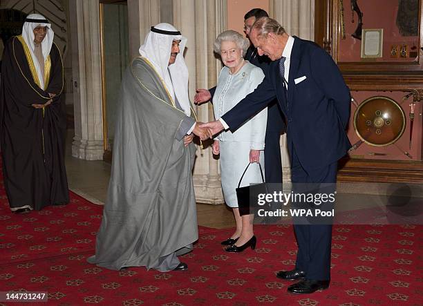 Queen Elizabeth II and Prince Philip, Duke of Edinburgh greet The Crown Prince of Abu Dhabi, Sheikh Nasser Mohammed Al-Ahmed Al-Sabah of Kuwait as he...
