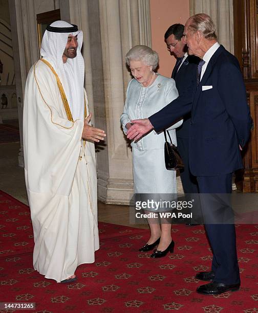 Queen Elizabeth II and Prince Philip, Duke of Edinburgh greet The Crown Prince of Abu Dhabi, Sheikh Mohammed bin Zayed Al Nahyan as he arrives at a...