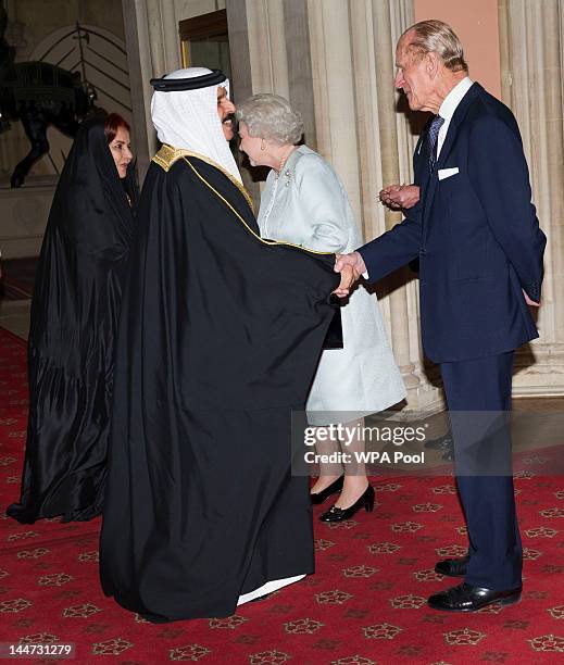 Queen Elizabeth II and Prince Philip, Duke of Edinburgh greet The King of Bahrain Hamad bin Isa Al Khalifa and Princess Sabeeka as they arrive at a...