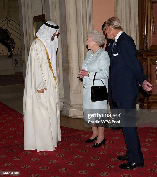 Queen Elizabeth II and Prince Philip, Duke of Edinburgh greet The Crown Prince of Abu Dhabi, Sheikh Mohammed bin Zayed Al Nahyan as he arrives at a...