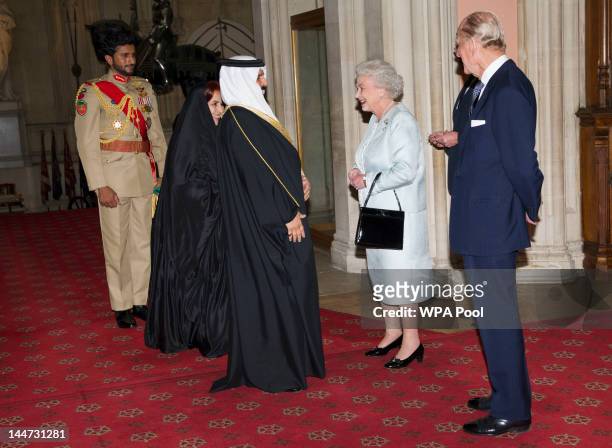 Queen Elizabeth II and Prince Philip, Duke of Edinburgh greet The King of Bahrain Hamad bin Isa Al Khalifa and Princess Sabeeka as they arrive at a...