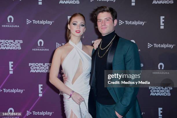 Daniela MartÃnez Caballero and Nicolás Haza pose for a photo during the red carpet for the People´s Choice Awards at Universal Pictures on December...