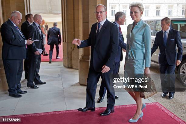 Prince Albert II of Monaco and Princess Charlene of Monaco arrive at a lunch For Sovereign Monarchs in honour of Queen Elizabeth II's Diamond...