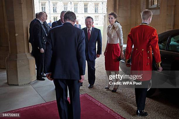 King Abdullah II of Jordan and Queen Rania of Jordan arrive at a lunch For Sovereign Monarchs in honour of Queen Elizabeth II's Diamond Jubilee, at...