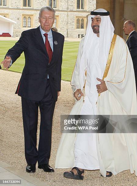 The Crown Prince of Abu Dhabi, Sheikh Mohammed bin Zayed Al Nahyan is greeted by a member of household staff as they arrive at a lunch for Sovereign...