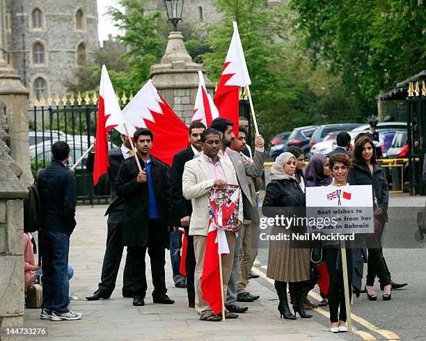 Bahrain protesters outside Windsor Castle as Queen Elizabeth II hosts A Lunch For Sovereign Monarchs on May 18, 2012 in Windsor, England.