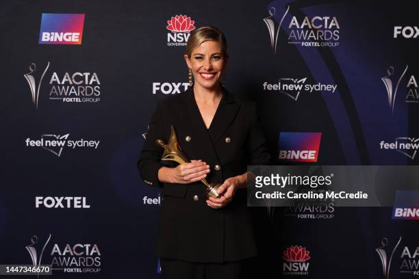 Brooke Satchwell poses in the media room with the AACTA Award for Best Supporting Actress in a Drama during the 2022 AACTA Awards Presented By Foxtel...