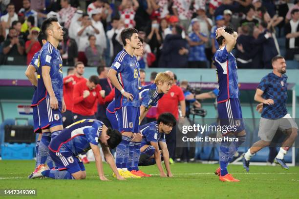 Players of Japan show dejection at the end of the penalty shoot out during the FIFA World Cup Qatar 2022 Round of 16 match between Japan and Croatia...