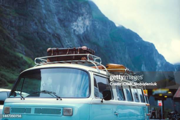 vintage camper van in mountains - car camping luggage stock pictures, royalty-free photos & images